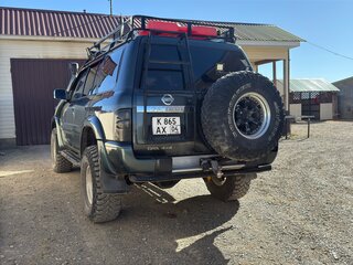 1999 Nissan Patrol V (Y61), серый, 1850000 рублей, вид 4