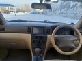 2002 Toyota Corolla IX (E120, E130), белый, 500000 рублей - вид 7