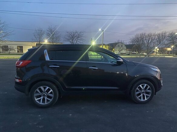 2010 Kia Sportage III, чёрный, 1100000 рублей - вид 1
