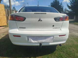 2013 Mitsubishi Lancer X Рестайлинг, белый, 1100000 рублей, вид 4