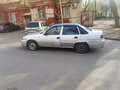 2012 Daewoo Nexia I Рестайлинг, серебристый, 140000 рублей - вид 3
