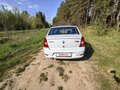 2012 Renault Logan I Рестайлинг, белый, 399000 рублей - вид 2