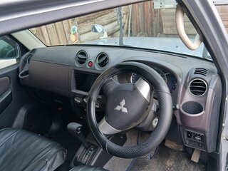 2009 Mitsubishi Pajero Mini II, серый, 815000 рублей, вид 4
