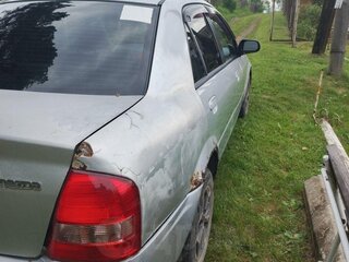 1999 Mazda Familia VIII (BJ), серый, 130000 рублей, вид 4