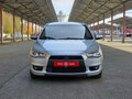 2010 Mitsubishi Lancer X, серебристый, 699900 рублей - вид 2