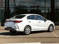 2021 Kia Rio IV Рестайлинг, белый - вид 3