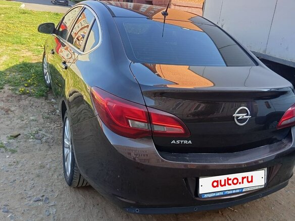 2013 Opel Astra J Рестайлинг, коричневый, 670000 рублей - вид 3