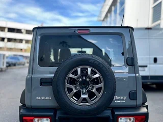 2023 Suzuki Jimny Sierra IV, серый, 2800000 рублей, вид 4