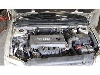 2004 Toyota Corolla IX (E120, E130), серебристый, 650000 рублей, вид 2