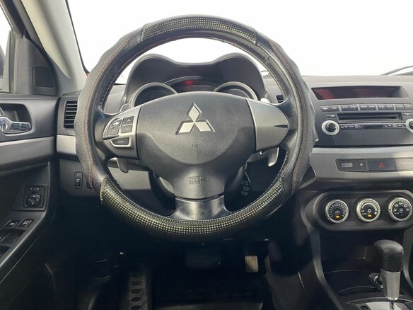 2008 Mitsubishi Lancer X, синий - вид 16