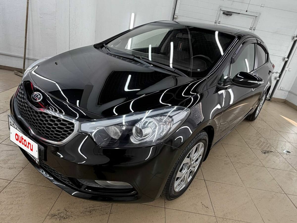Открыть фотографии: Kia Cerato III