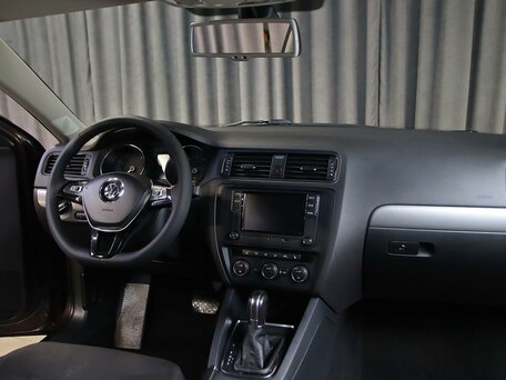 2016 Volkswagen Jetta VI Рестайлинг, коричневый, 1099000 рублей, вид 5