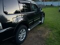 2013 Mitsubishi Pajero IV Рестайлинг 1, чёрный, 1470000 рублей - вид 4