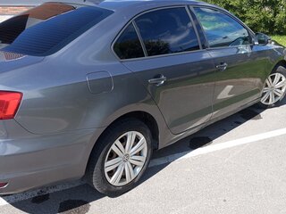 2015 Volkswagen Jetta VI Рестайлинг, серый, 880000 рублей, вид 3