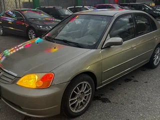 2002 Honda Civic VII, коричневый, 315000 рублей, вид 1