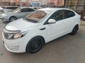 2014 Kia Rio 4-speed III, белый, 780000 рублей