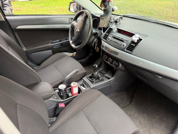 2011 Mitsubishi Lancer X Рестайлинг, белый, 750000 рублей - вид 4