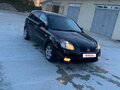 2011 Kia Rio II Рестайлинг, чёрный, 450000 рублей