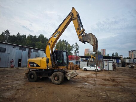 2011 Caterpillar M315, жёлтый, 3600000 рублей, вид 1