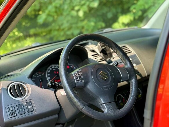 2010 Suzuki Swift III, оранжевый, 720000 рублей - вид 10