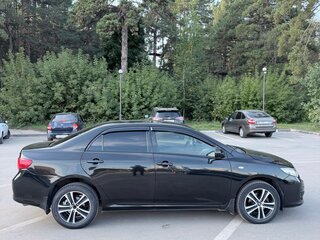 2007 Toyota Corolla X (E140, E150), чёрный, 750000 рублей, вид 3
