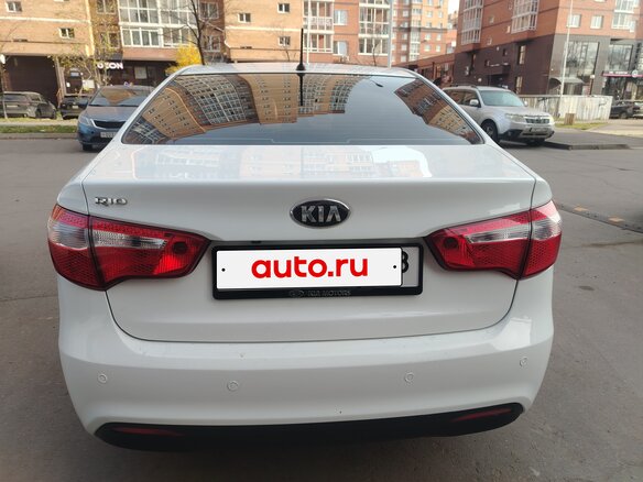 2014 Kia Rio 4-speed III, белый, 780000 рублей - вид 5