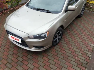 2011 Mitsubishi Lancer X Рестайлинг, бежевый, 600000 рублей, вид 1