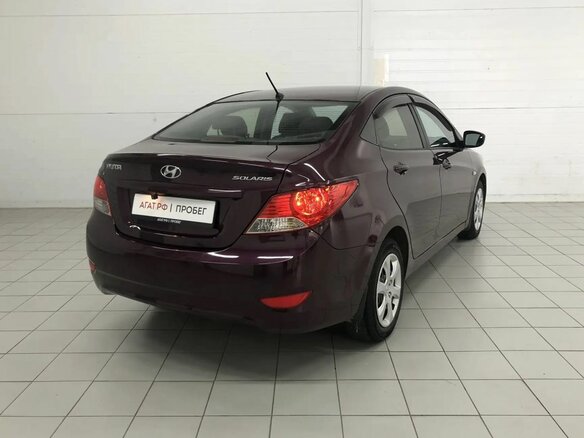 2014 Hyundai Solaris I, фиолетовый, 940000 рублей - вид 5