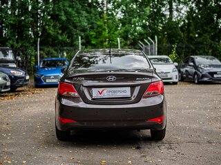 2014 Hyundai Solaris I Рестайлинг, коричневый, 875000 рублей, вид 4