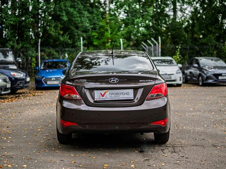 2014 Hyundai Solaris I Рестайлинг, коричневый, 875000 рублей, вид 4