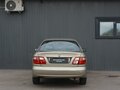 2004 Nissan Almera II (N16) Рестайлинг, золотистый - вид 4