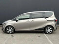2021 Toyota Sienta II Рестайлинг, серый - вид 1