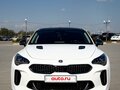 2020 Kia Stinger I Рестайлинг, белый - вид 3