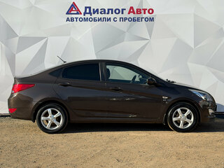 2016 Hyundai Solaris I Рестайлинг, коричневый, 940000 рублей, вид 4