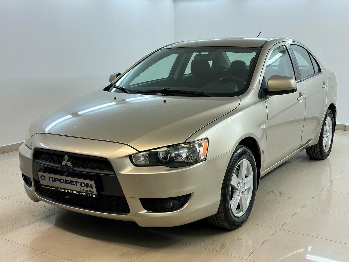 Открыть фотографии: Mitsubishi Lancer X