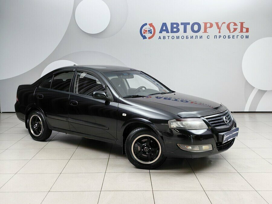 Открыть фотографии: Nissan Almera Classic I