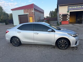 2013 Toyota Corolla XI (E160, E170, E180), серебристый, 920000 рублей, вид 2