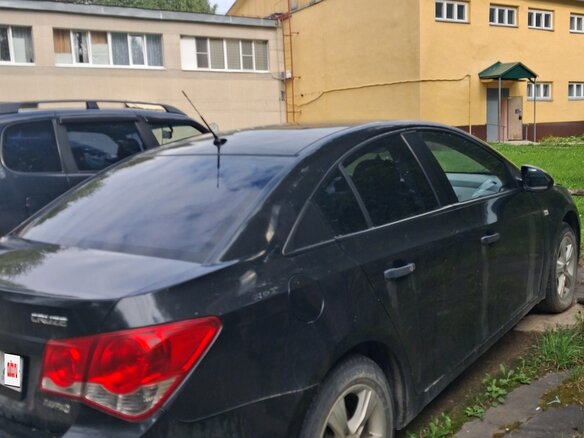 2010 Chevrolet Cruze I, чёрный, 600000 рублей - вид 1