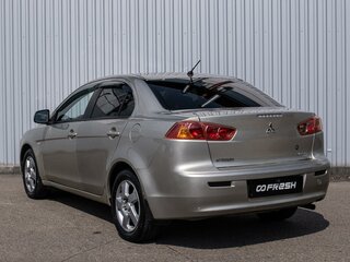 2008 Mitsubishi Lancer X, золотистый, 739000 рублей, вид 2