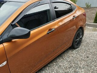 2014 Hyundai Solaris I Рестайлинг, оранжевый, 470000 рублей, вид 3