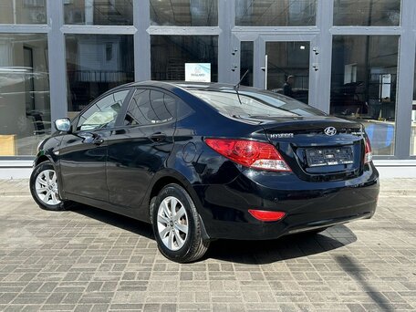 2014 Hyundai Solaris I, чёрный, 830000 рублей, вид 2