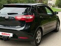2013 Kia Rio 4-speed III, чёрный, 620000 рублей - вид 4