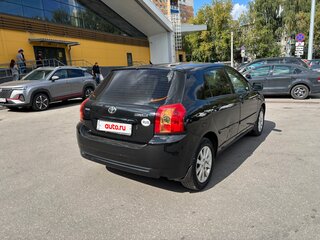 2004 Toyota Corolla IX (E120, E130) Рестайлинг, чёрный, 405000 рублей, вид 3