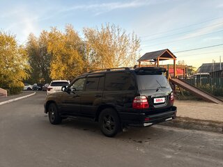 2003 Toyota Land Cruiser 100 Series Рестайлинг 1, чёрный, 1800000 рублей, вид 3