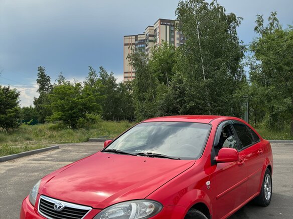 2014 Daewoo Gentra II, красный, 530000 рублей