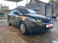 2014 Kia Rio III, коричневый - вид 1