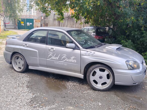 2004 Subaru Impreza II Рестайлинг 1, серебристый - вид 2