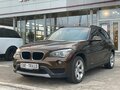 2014 BMW X1 20i I (E84) Рестайлинг, коричневый, 1400000 рублей - вид 1