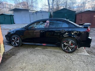 2012 Mitsubishi Lancer X Рестайлинг, чёрный, 980000 рублей, вид 2