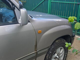 2004 Toyota Land Cruiser 100 Series Рестайлинг 1, серебристый, 2100000 рублей, вид 4